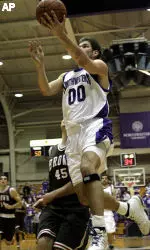 Tim Doyle heads to the basket past Brown's Matt Mullery during the second half.