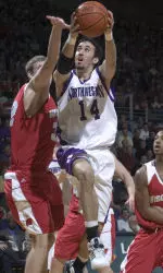 Northwestern's Mohamed Hachad goes up for a layup during the second half. (Stephen Carrera)
