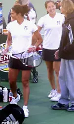No 13 Cristelle Grier (center) and Alexis Prousis (left) advance to NCAA doubles semifinal with win over No. 10 Georgia Tech.