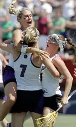 Kristen Kjellman and teammates begin the celebration.