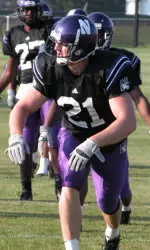 Senior Bryan Heinz warms up at NU's first Camp Kenosha practice.