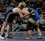 Junior Dustin Fox gave NU the 19-18 victory with a 3-2 decision in the final match.