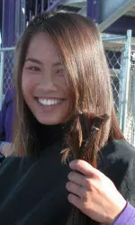 Jessica Lau holds her hair she cut to donate.