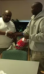 Reggie McPherson shakes the hand of a veteran during his visit.