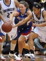 Meshia Reed battles for a loose ball Thursday afternoon against DePaul.