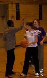 Wildcats play ball with support of a new friend.