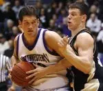 Northwestern's Tim Doyle, left, drives around Purdue's Chris Kramer during the first half. (AP Photo/Nam Y. Huh)
