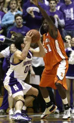 Illinois' Warren Carter guards Tim Doyle during the first half.