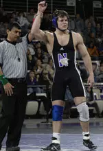 Jake Herbert wrestles Michigan's Tyrel Todd in Friday night's semifinals.