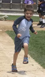 Kids' Club members ran the bases, then devoured pizza Saturday at Rocky Miller Park