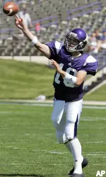 C.J. Bacher throws a pass in the first half. (AP Photo/Kamil Krzaczynski)