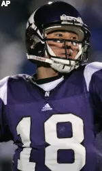C.J. Bacher throws a pass during the first quarter. (AP Photo/Jerry Lai)