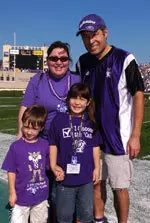 Lillian Masson was the lucky Wildcat Kids' Club member selected to retrieve the Wildcats tee after the kickoff.