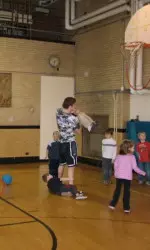 Brian Peters has some fun with elementary students from Evanston.