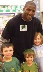 Omar Conteh embraces his Irish side with some new friends at St. Athanasius.