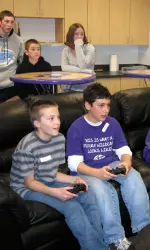 Kids got the opportunity to play video games in the team's new lockerroom.