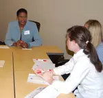 Anucha Browne Sanders mentors female student-athletes during speed-networking session.