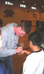 Patrick Pohlen meets and signs autographs for young fans.