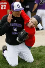 Brant Cavagnaro and friend share a good time at Sunday's Buddy Ball event.