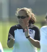 NU Head Coach Kelly McCollum took members of the Wildcat field hockey team to coach during