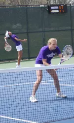 Georgia Rose (foreground) picked up one singles and two doubles wins on the opening day of the Wildcat Invitational.