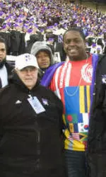 Trai Essex, pictured here with longtime NU equipment manager Bill Jarvis, and his Pittsburgh teammates were on the sidelines of NU's win over Illinois on Nov. 22.