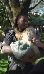 Marshall Thomas meets a new friend, a sloth, at Busch Gardens.