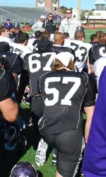 Northwestern head coach Pat Fitzgerald fires up his troops post practice.