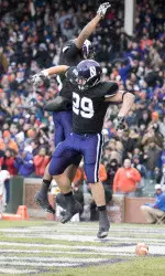 Mike Trumpy, who finished Saturday's game against illinois with 141 all-purpose yards, celebrates his 80-yard TD run.