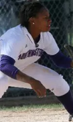 Robin Thompson awaits a throw into third base