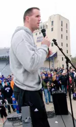 Head coach Pat Fitzgerald addresses Wildcat Nation prior to Saturday's scrimmage on Walker Terrace.