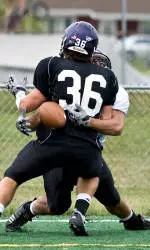 John Plasencia, screened by teammate Cooper Gerami, opened some eyes in last August's Kenosha scrimmage by making this spectacular catch in the end zone.