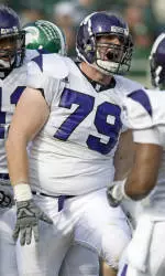 Adam Hahn celebrated a tackle, and now can celebrate being one of the NU student-athletes with a perfect 4.0 GPA in 2009-10.
