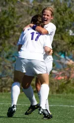 Kate Allen and Jill Dunn celebrate Allen's game-winning goal at Lakeside Field Sunday.