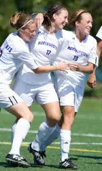 Kate Allen (center) celebrates her first collegiate goal Sunday against DePaul.