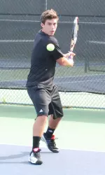 Raleigh Smith posted a two-set win in his first career match on the No. 4 singles line Friday.