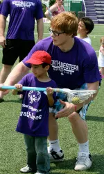 Freshman wrestler Mike McMullan was one of nearly 100 NU student-athletes to help with the inaugural Young Athletes Field Day