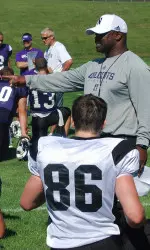 Dennis Springer coaches up his wide receivers in his first official practice at Camp Kenosha.