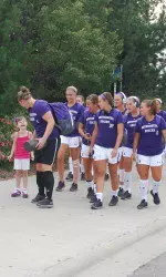 Hallie greets the NU women's soccer team before the 2012 home opener vs. Marquette.