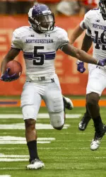 Venric Mark, pictured here on his way to a school-record 134 punt return yards vs. Syracuse, was named a first-team FWAA All-American punt returner.
