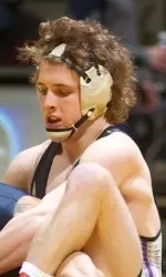 Kaleb Friedley was one of four Wildcats to win the match in Session II.