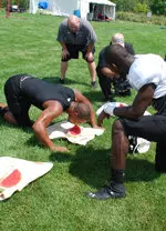 Northwestern held its annual watermelon-eating contest for the freshman class after practice Tuesday.