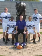 Head coach Pat Fitzgerald and Northwestern's 2012 team captains: Brian Arnfelt, David Nwabuisi, Kain Colter and Brian Mulroe.