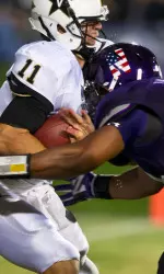 Chi Chi Ariguzo levels a blow to Vanderbilt quarterback Jordan Rodgers, one of his 10 tackles on the evening.