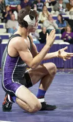 Dominick Malone was one of two true freshmen with victories for the Wildcats Friday night against MSU.