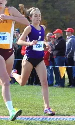 Andrea Ostenso crosses the finish line as Northwestern's top finisher at the 2013 Big Ten Championships.