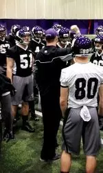 Pat Fitzgerald (center) and the Wildcats will hold nine practices before pausing for final exams and spring break in late March.