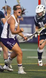 Alyssa Leonard celebrates after scoring one of her four goals against Penn State Saturday night.