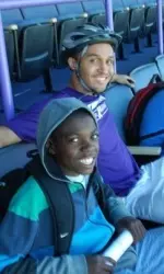 Reggie Hearn and his mentee from Haven Middle School check out the Stadium Club.