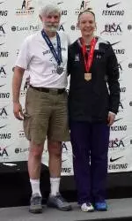 Head coach Laurie Schiller (left) and Courtney Dumas on the medal stand in Columbus.
